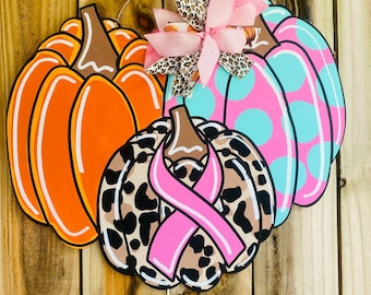 breast cancer awareness pumpkin door hanger , pumpkin door hanger