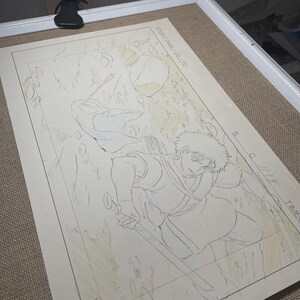 May include: An original animation cel from Studio Ghibli, featuring a detailed sketch of a character with a sword and bow. The artwork is on a beige background, with the text "STUDIO GHIBLI CO.LTD" visible.