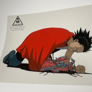May include: A red-clothed character with black hair is shown in a dramatic pose, reaching down to a mechanical, bio-organic creature. The image is from the Japanese animation studio "映 ANIMATION".