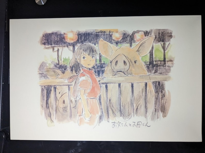 May include: A watercolor illustration of a young girl with long brown hair standing in front of a pen of pigs. The girl is wearing a red and white dress and is looking at the viewer. The pigs are brown and white and are looking at the girl. The illustration is signed "Studio Ghibli" in Japanese.