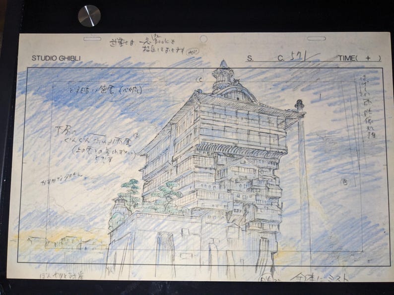 May include: A black and white pencil drawing of a multi-level building with a complex design. The building is surrounded by a light blue sky with clouds. The drawing is labeled "Studio Ghibli" and "S. C. 521".
