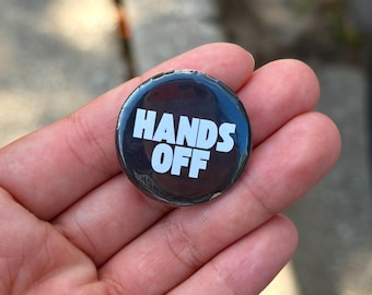resist pinback button – 1.25” protest badge – feminist accessory – hands off pin – pro-choice merch