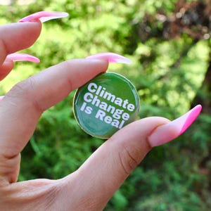 climate change is real 1.25-inch pinback button | environmental activism pin | environmental crisis