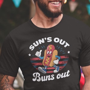 Sun's Out Buns Out Hot Dog T-Shirt – Funny Patriotic 4th of July BBQ Tee with Retro Cartoon Mustard Character and Vintage USA Vibes