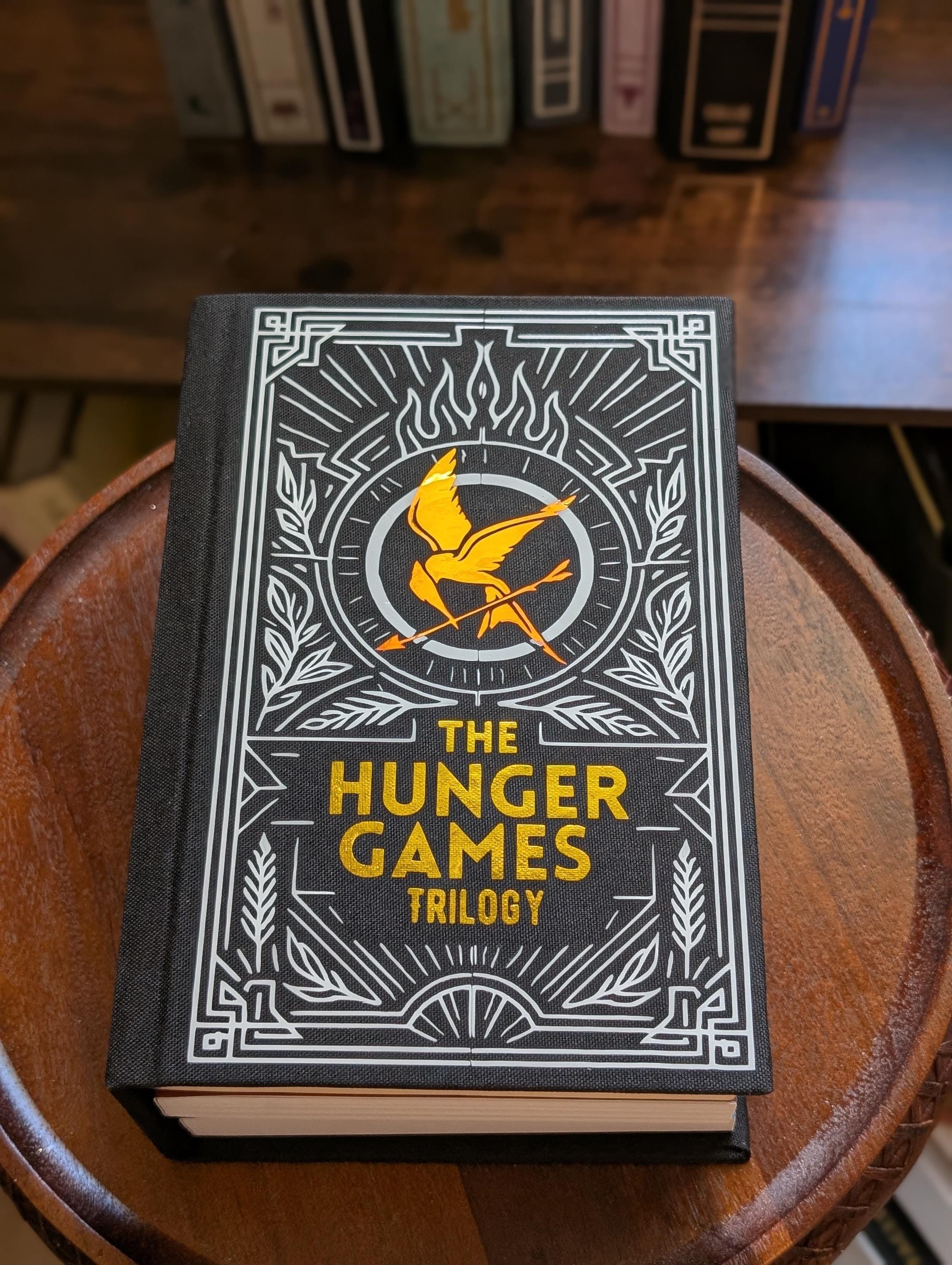 The Hunger Games Trilogy by Suzanne Collins: Custom Rebound