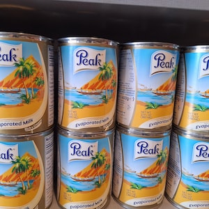 Peakmilk concentré 380 ml, lait concentré, lait entier non sucré.