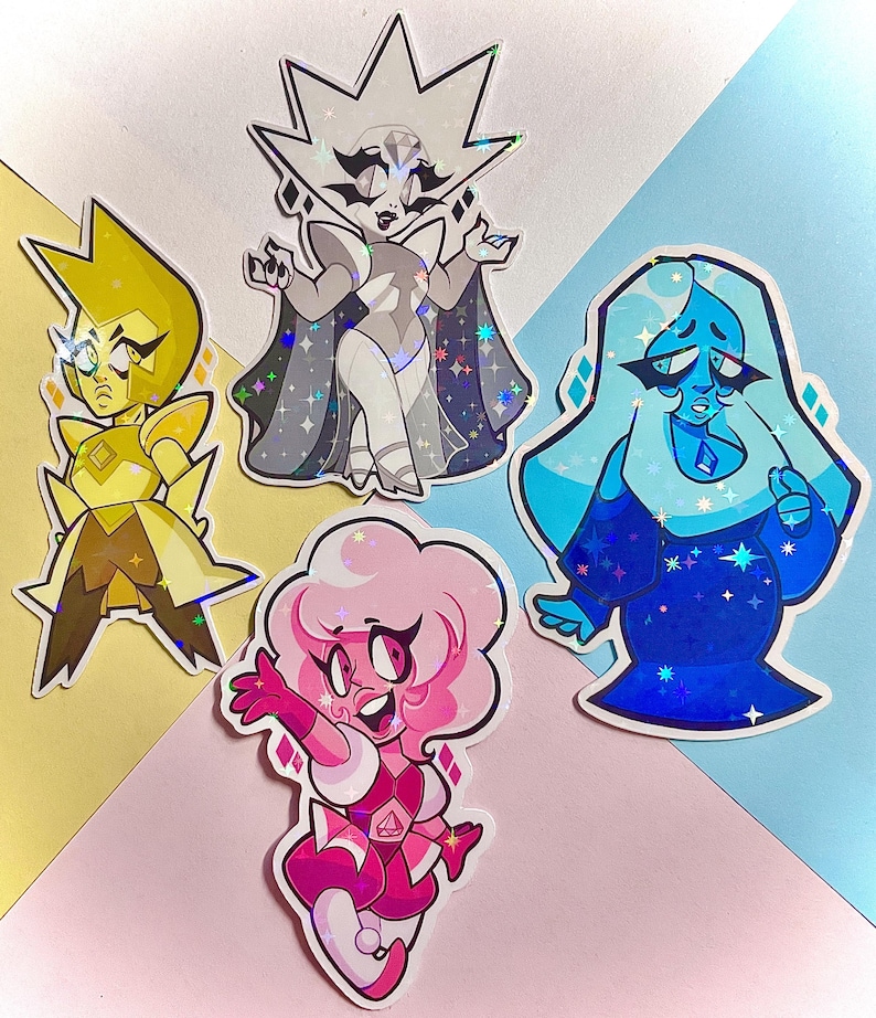 May include: Four cartoon stickers featuring diamond-shaped characters in yellow, white, blue, and pink. The stickers have a holographic effect and are set against a colorful background. Each character has a unique design and expression.