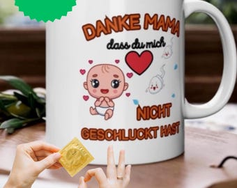 White mug with baby motif and funny saying "Thank you, Mom, for not swallowing me"