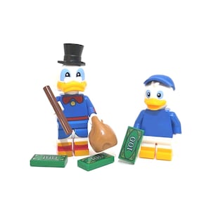 May include: Two Lego figures of cartoon characters, one wearing a top hat and holding a brown stick and a money bag, the other wearing a blue cap. Green Lego bills with the number 100 are in the scene.