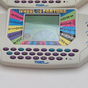 Handheld Game Console Lot Tested Working Retro Electronic Games Bundle Kaboom Wheel of Fortune Baseball Pocket Poker image 14