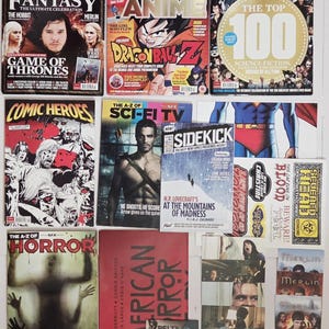 May include: A collection of various entertainment magazines and promotional materials featuring themes of fantasy, anime, science fiction, comics, and horror. The items display titles such as Game of Thrones, Dragon Ball Z, Comic Heroes, and The Shining.