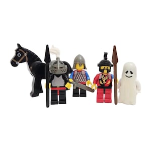 May include: A collection of Lego figures including a black horse, three knights, and a white ghost figure. The knights wear helmets and armor, and carry weapons. The ghost figure has a smiling face.