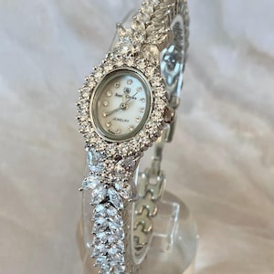 Floral-shaped Case AA Grade Simulated Marquis cut Round Brillant cut Diamond Mother of Pearl Dial Face Ladies Bracelet Watch | Party | Event