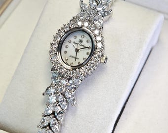 Floral Simulated Diamond Ladies Watch: Mother of Pearl Dial, 18K White Gold Plated