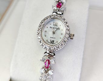 Limited Edition Mother of Pearl Dial Face Marquise-cut Imitation Ruby Accents AA Grade Simulated Diamond Bracelet Ladies Dress Watch