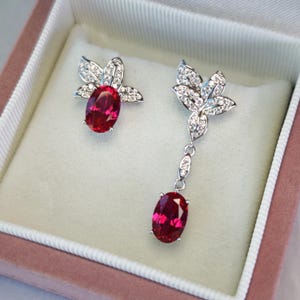 Asymmetrical Design Flower Shape Oval-cut Ruby Drop Earrings S925 Silver with 18K White Gold Plated