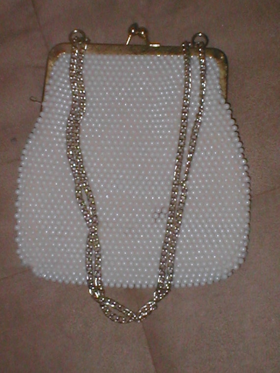 white pearl handle bag