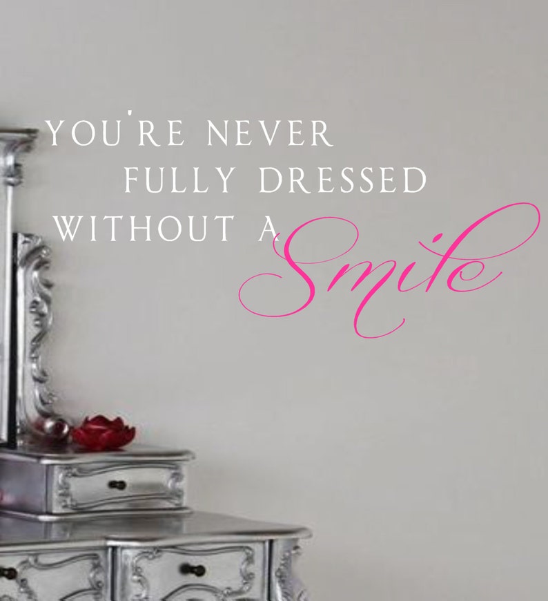 Wall Decal You&#39;re never fully dressed without a smile | Etsy