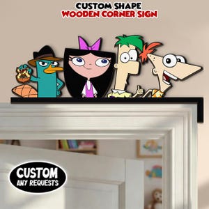May include: A wooden corner sign featuring cartoon characters. The sign has the text "CUSTOM SHAPE WOODEN CORNER SIGN" at the top and "CUSTOM ANY REQUESTS" at the bottom. The characters include a platypus, a girl with a pink bow, and two boys.