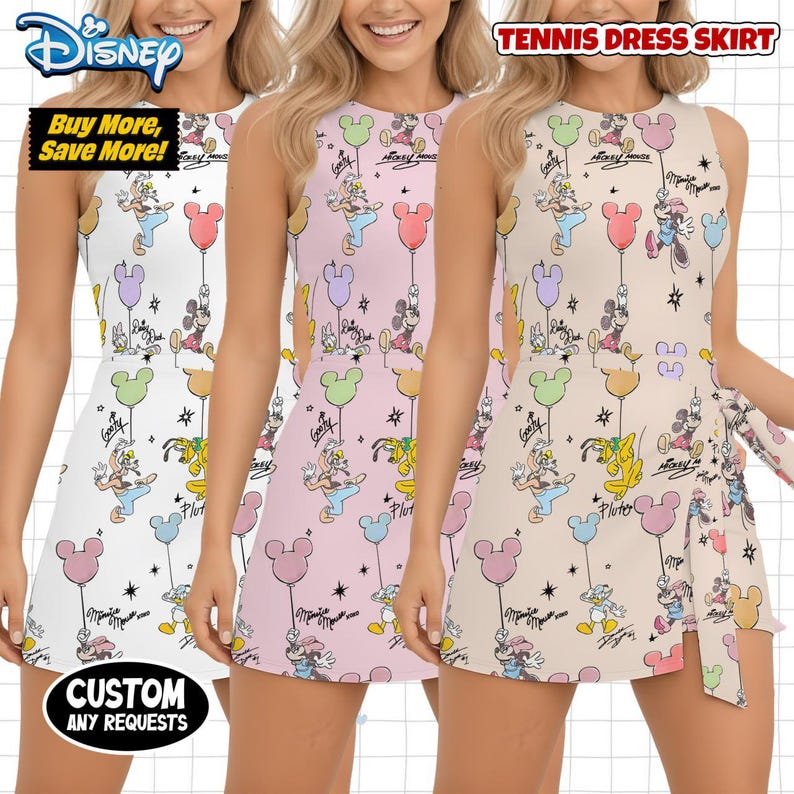 May include: Sleeveless tennis dress skirts in white, pink, and beige, adorned with a Disney character pattern including Mickey Mouse, Donald Duck, and Pluto with balloons. The dresses have a side tie.