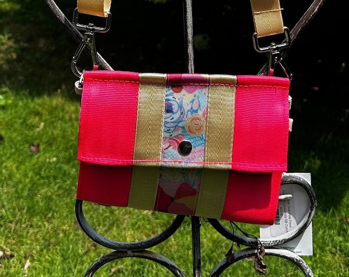 Pink and Pink Floral Foldover Crossbody Seatbelt Clutch from FiberTime