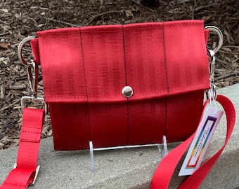 Stryker Red Foldover Crossbody Seatbelt Clutch from FiberTime