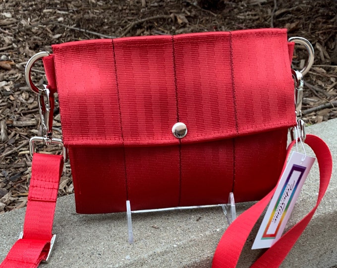 Foldover Crossbody Seatbelt Clutch from FiberTime in Deep Red!