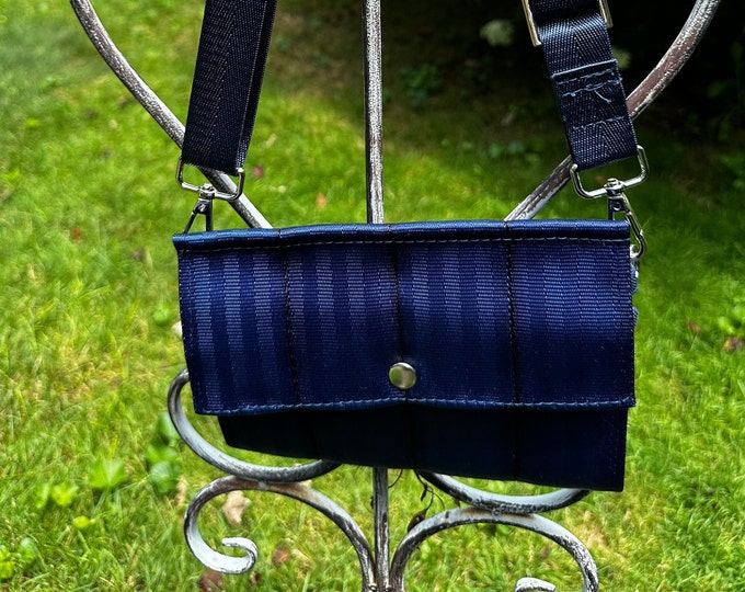 Foldover Crossbody Seatbelt Clutch from FiberTime in Navy
