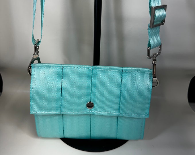 Minty Aqua Foldover Crossbody Seatbelt Clutch from FiberTime