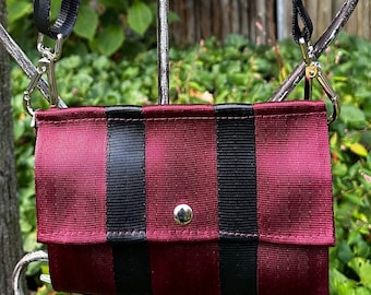 Foldover Crossbody Seatbelt Clutch from FiberTime in Ruby and Black!