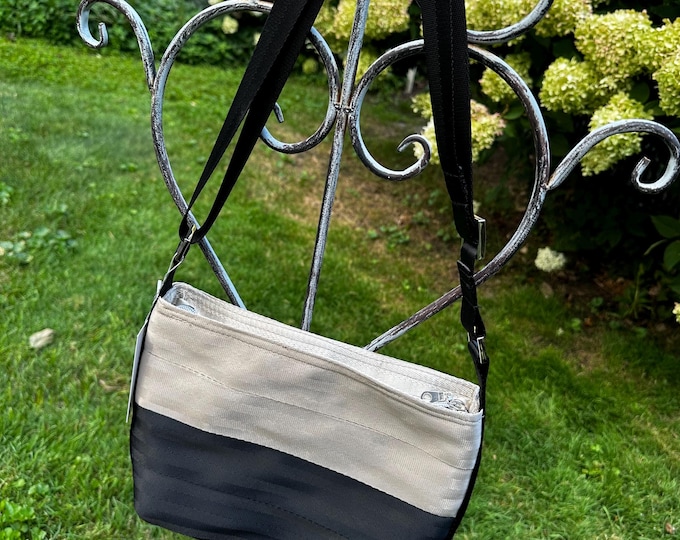 Tan and Black Medium Baguette Seat Belt Bag!