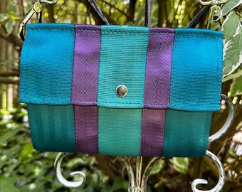 Foldover Crossbody Seatbelt Clutch in Peacock, Teal and Purple