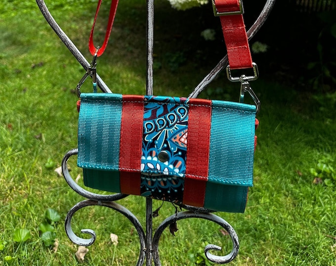 Teal Orange and Paisley Foldover Crossbody Seatbelt Clutch from FiberTime