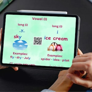 May include: A tablet displaying a lesson on long vowel sounds. The screen shows the words "sky" and "ice cream" with examples like "fly" and "spider." A stylus rests on top. The text "UNICORN MAGIC CARDS" is visible at the bottom.