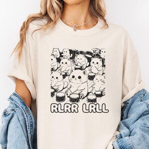Purr-fect Fusion of Feline and Rock 'n Roll: Unique Cat Drummer T-Shirt