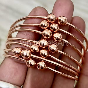 Handcrafted Copper Ball Bangles - West Indian Stacking Jewelry - Set of 7