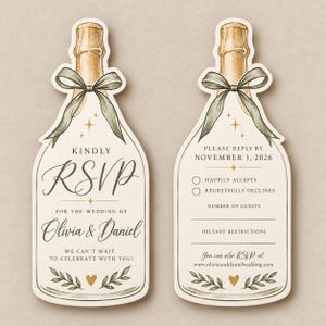 May include: Two die-cut RSVP cards shaped like champagne bottles. The left card reads KINDLY RSVP FOR THE WEDDING OF OLIVIA & DANIEL. The right card reads PLEASE REPLY BY NOVEMBER 1, 2026, with checkboxes for accepting or declining the invitation.