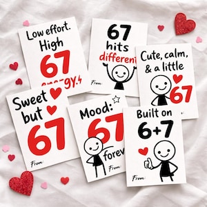 May include: A set of white cards featuring the number 67 in red, with different phrases and stick figure drawings. The cards display text such as "Low effort," "Sweet but," and "Built on 6+7." Small red heart decorations are scattered around the cards.