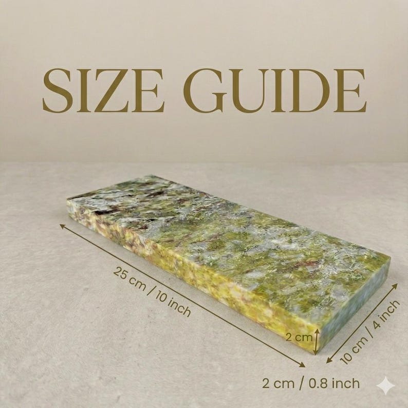 May include: A rectangular stone with a green and brown marbled pattern. The dimensions are 10 inches long, 4 inches wide, and 0.8 inches thick. The text "SIZE GUIDE" is at the top of the image.