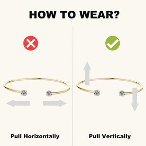 May include: A gold-colored bracelet with a clear gemstone at each end. The image shows how to wear the bracelet, with the text "HOW TO WEAR?" at the top. The text below the bracelet says "Pull Horizontally" and "Pull Vertically".