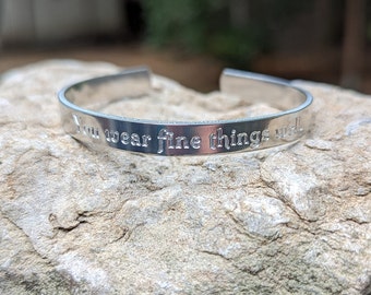 You wear fine things well. Our Flag Means Death Inspired Gentlebeard Engraved Aluminium Cuff Bracelet