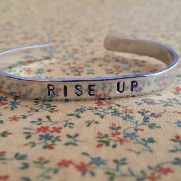 Pulsera de aluminio estampada a mano inspirada en el musical "Rise Up" de Alexander Hamilton