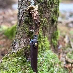 Handmade traditional hunting knife made of deer horn