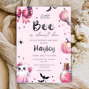 May include: A pink baby shower invitation with the text "a little Boo is almost due" and "Hayley" in a whimsical font. The invitation features illustrations of a ghost, pumpkin, bats, and a potion bottle.