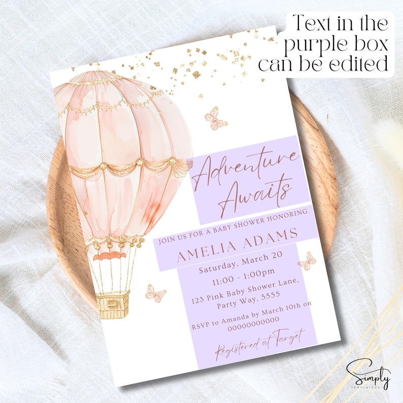 May include: A baby shower invitation featuring a pink and gold hot air balloon illustration. The text reads "Adventure Awaits" and "Amelia Adams". The invitation includes details for the event, including the date, time, location, and RSVP information. The text "Registered at Target" is also included.