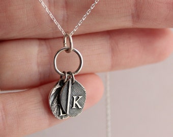 Personalized nature charm necklace.