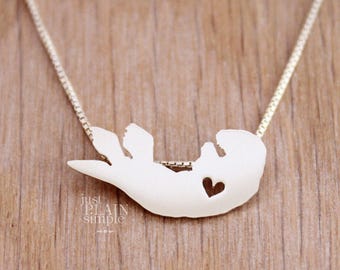 Tiny Sea Otter necklace, sterling silver hand cut pendant and heart