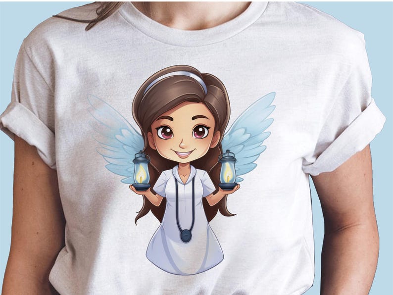 May include: White t-shirt featuring a cartoon illustration of a girl angel with brown hair and blue wings holding two lanterns. The girl is wearing a white dress and a necklace with a pendant.