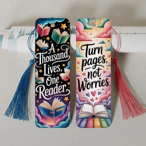 May include: Two colorful bookmarks with tassels. One features the text "A Thousand Lives, One Reader" with illustrations of books and stars. The other says "Turn pages, not worries" with hearts and book illustrations. Both have a tassel.