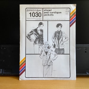 May include: A sewing pattern for a shawl and cardigan jacket. The pattern is for sizes 28 to 44. The pattern is designed by Ann Person and is for knit fabrics. The pattern is called Stretch & Sew 1030.